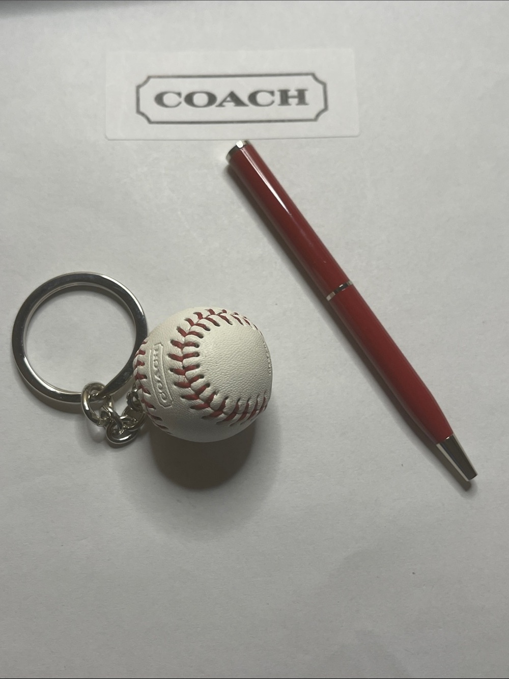 Coach White Leather Baseball Keychain with Red Stitching and Coach Pen - Picture 2 of 7